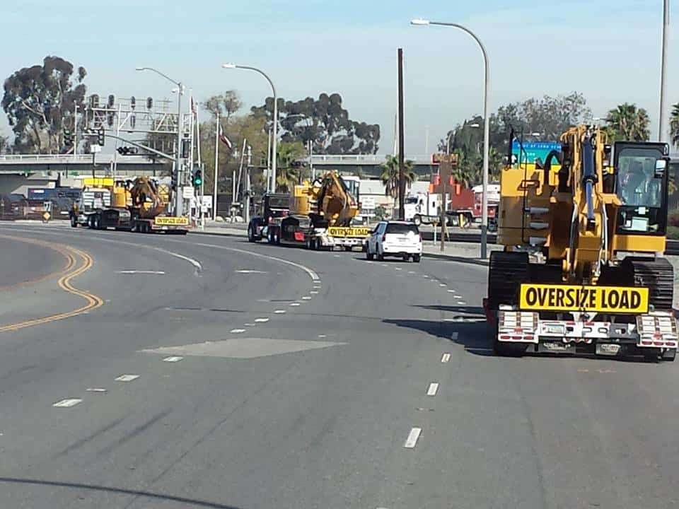 Oversize load and pilot cars.