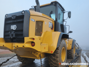 transporting a CAT 988B wheel loader