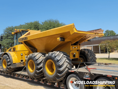 Dump truck being towed